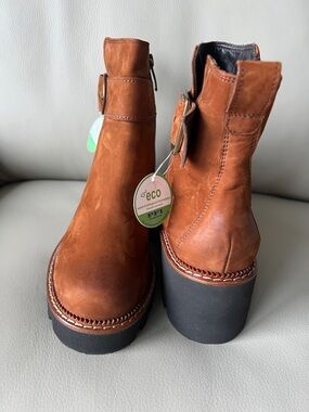 Black leather bootie. Black nubuck leather. US 7 Brand new in Box.